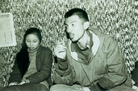 Photograph of <i>(left to right)</i> Xiao Lu and Tang Song at the ‘China/Avant-Garde Exhibition’, 1989. (Photo courtesy: Wang Youshen)