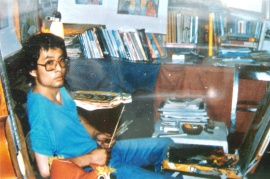 Photograph of Zhang Xiaogang at his studio in Chongqing, taken in 1986.