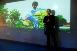 Huang and his work on show in Singapore, 2006.