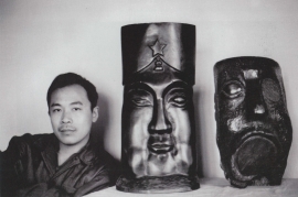 Photograph of Wang Keping and his sculptures, <i>Idol</i> <i>(left)</i> and <i>Silence</i> <i>(right)</i>, taken at his studio in Beijing, 1979. (Photo Courtesy: Wang Keping)
